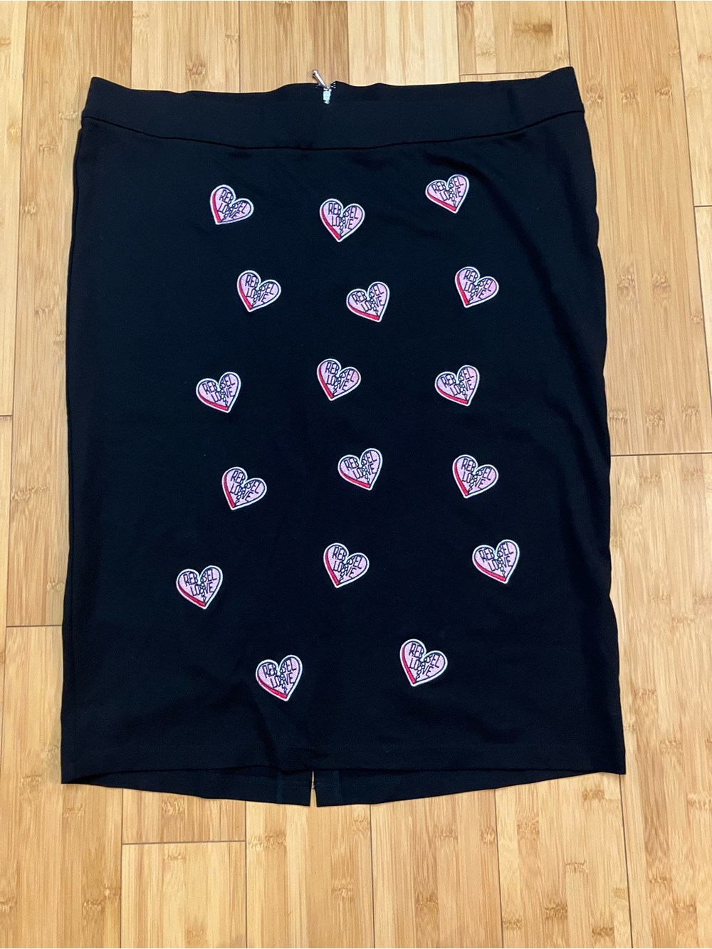 torrid Black Pencil Skirt with Pink & White Heart Motif for Rebel Wilson